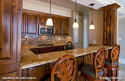 Bar seating at the wet bar. The Heatherstone plan 5016. 