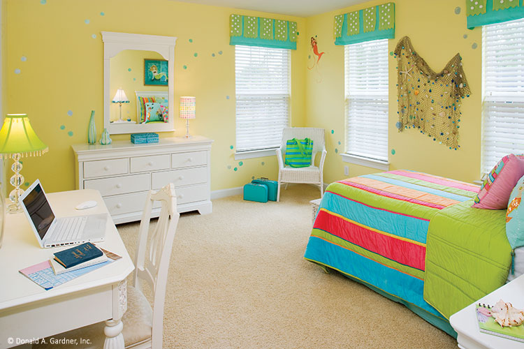 Yellow walls and carpet in the secondary bedroom. The Heywood plan 991.