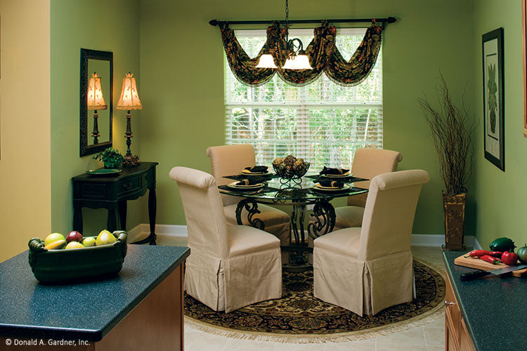 Double window and green walls in the breakfast room. The Heywood plan 991.