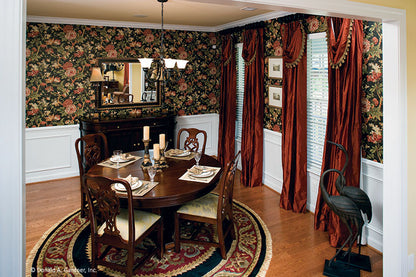 Falt ceiling and wainscoting in the dining room. The Heywood plan 991.