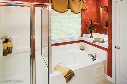 Walk-in shower next to the soaking tub in the master bathroom. The Heywood plan 991.