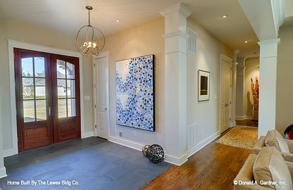 This is a photograph of the foyer of luxury house plan 5001 The Hickory Place as built by a customer