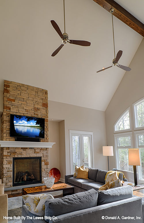 This is a photograph of the great room fireplace of luxury house plan 5001 The Hickory Place as built by a customer