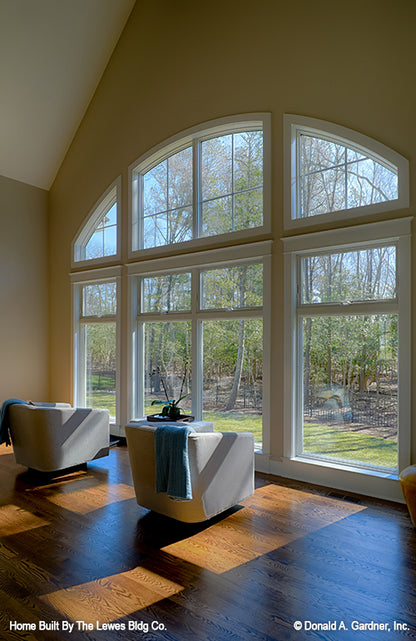 This is a photograph of the rear windows of luxury house plan 5001 The Hickory Place as built by a customer