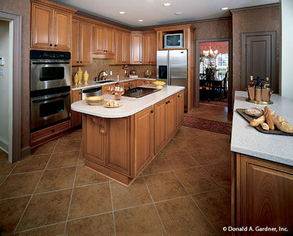 Kitchen with island and working counter space for Hickory Ridge house plan 916