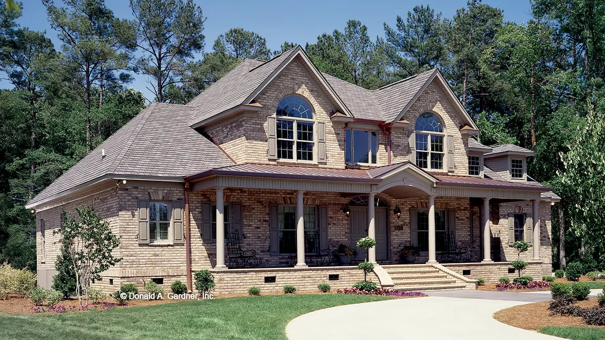 This is a photograph of the front of farmhouse house plan 916 The Hickory Ridge as built by a customer