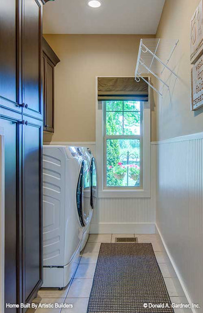 Utility room with storage for High-Pointe house plan 713