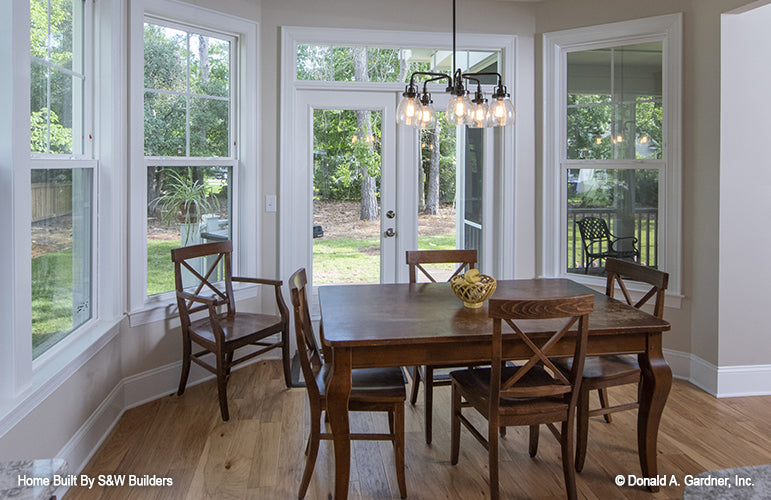 Large windows surrounding the breakfast nook. The Hinnman plan 1242. 