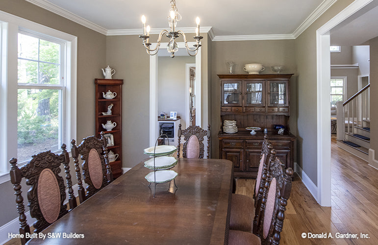 Chandelier and hallway view from the dining room. The Hinnman plan 1242. 