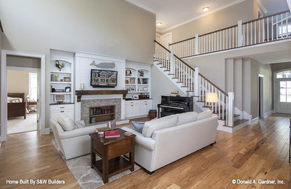 Great room view of the stairs and banister. The Hinnman plan 1242. 