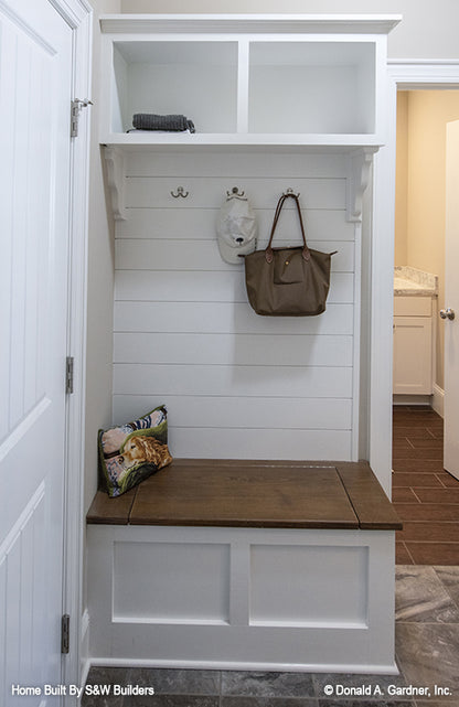 Wall tree in the mud room. The Hinnman plan 1242. 