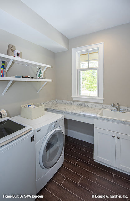 Sink and window in the utility room. The Hinnman plan 1242. 