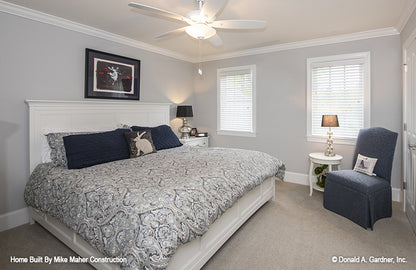 Crown molding along the ceiling in the secondary bedroom. The Holden plan 1168.