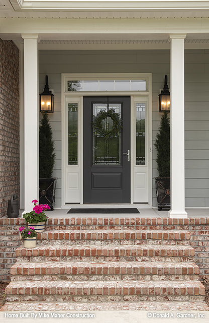 Brick steps leading to front porch. The Holden plan 1168.