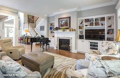 Fireplace with mantel in the great room. The Holden plan 1168.