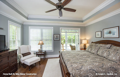 Tray ceiling and patio door in the master bedroom. The Holden plan 1168.