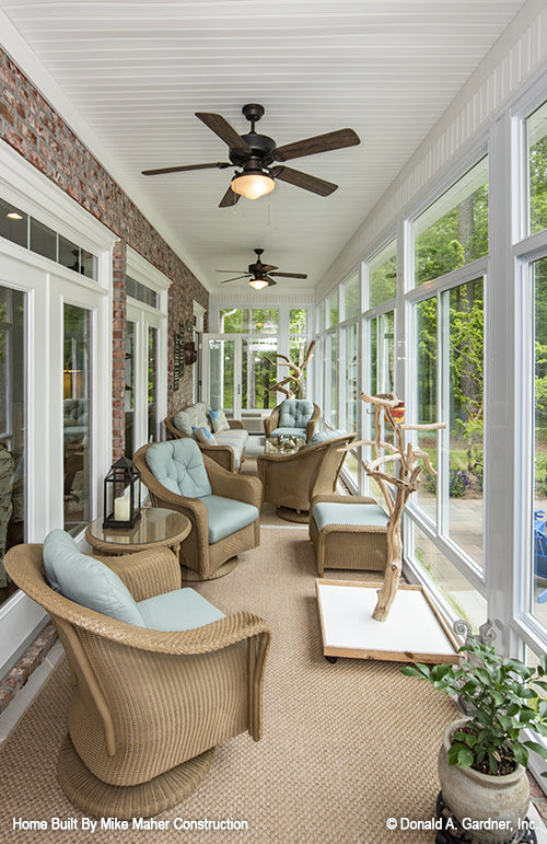 Ceiling fans in the sunroom. The Holden plan 1168.