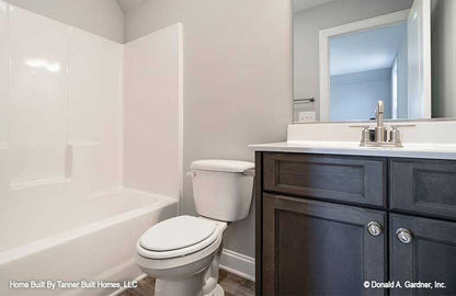 This is a picture of the bathroom of farmhouse house plan 1140 The Hollandale