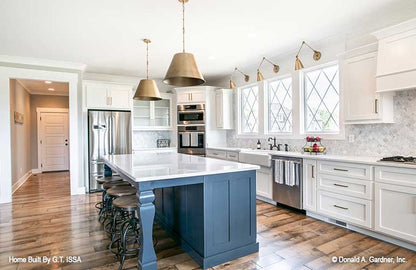 Large kitchen island with seating. The Hollowcrest plan 5019.