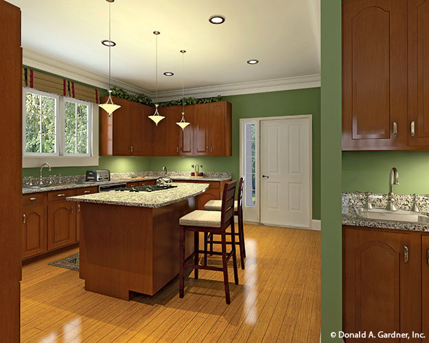 This is a kitchen island photo as built by a customer for farmhouse plan 864 The Hollyhock 