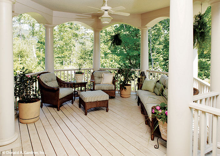 This is a front porch customer photo of farmhouse plan 864 The Hollyhock