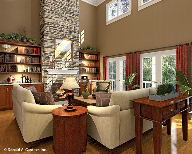 This is a customer photo of the great room and fireplace for farmhouse plan 864 The Hollyhock