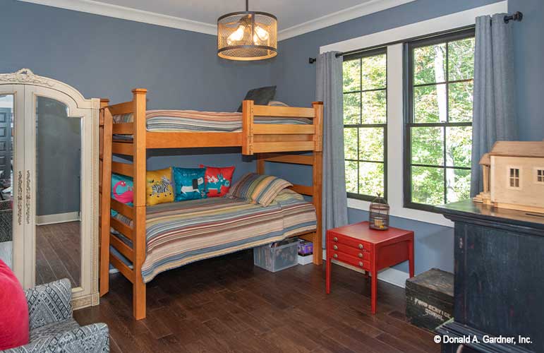 Crown molding along the ceiling in the bedroom. The Hunter Creek plan 1326.