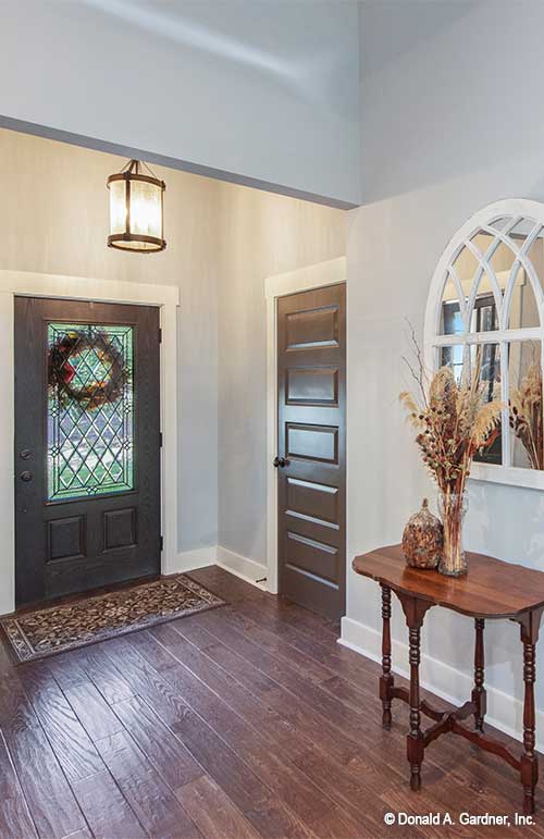 Glass panel entry door in the foyer. The Hunter Creek plan 1326.