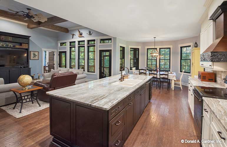 Large island with a sink in the kitchen. The Hunter Creek plan 1326.