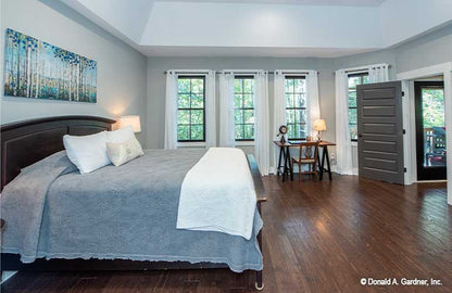 Wood floors in the master bedroom. The Hunter Creek plan 1326.