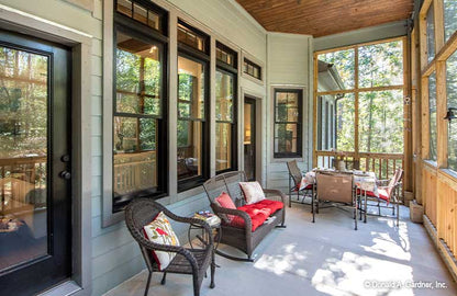 Sitting areas in the screened in porch. The Hunter Creek plan 1326.