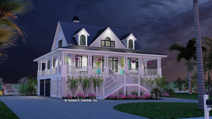 This is an illustration of the front of coastal house plan 856 The Hyacinth at dusk