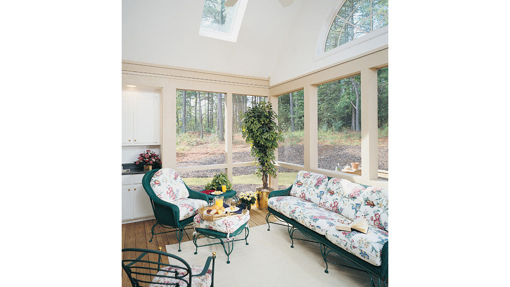 Full wall length windows in the screened in porch. The Ingraham plan 332.