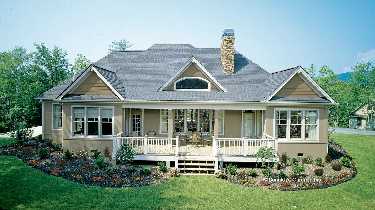 This is a photograph of the rear of one story house plan 727 The Indigo as built by a customer