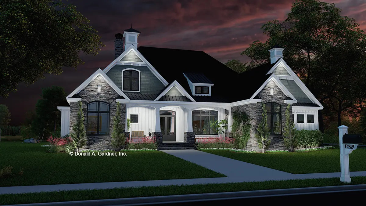 This is an illustration of the front of four bedroom house plan 1623 The Ingrid at dusk