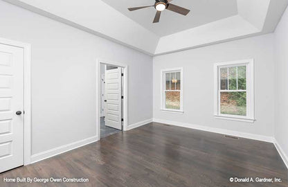 Two windows on the back wall in the master bedroom. The Ireland plan 346.