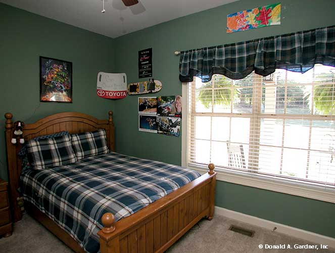 This is a photograph of a bedroom of farmhouse house plan 1075 The Ives as built by a customer