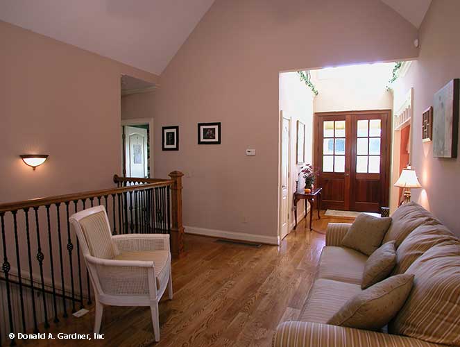 This is a photograph of the foyer of farmhouse house plan 1075 The Ives as built by a customer