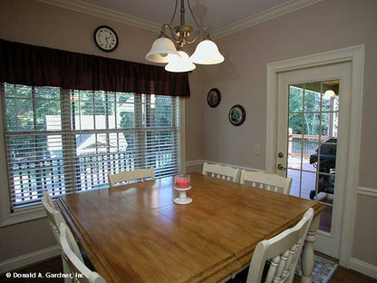 This is a photograph of the breakfast room of farmhouse house plan 1075 The Ives as built by a customer