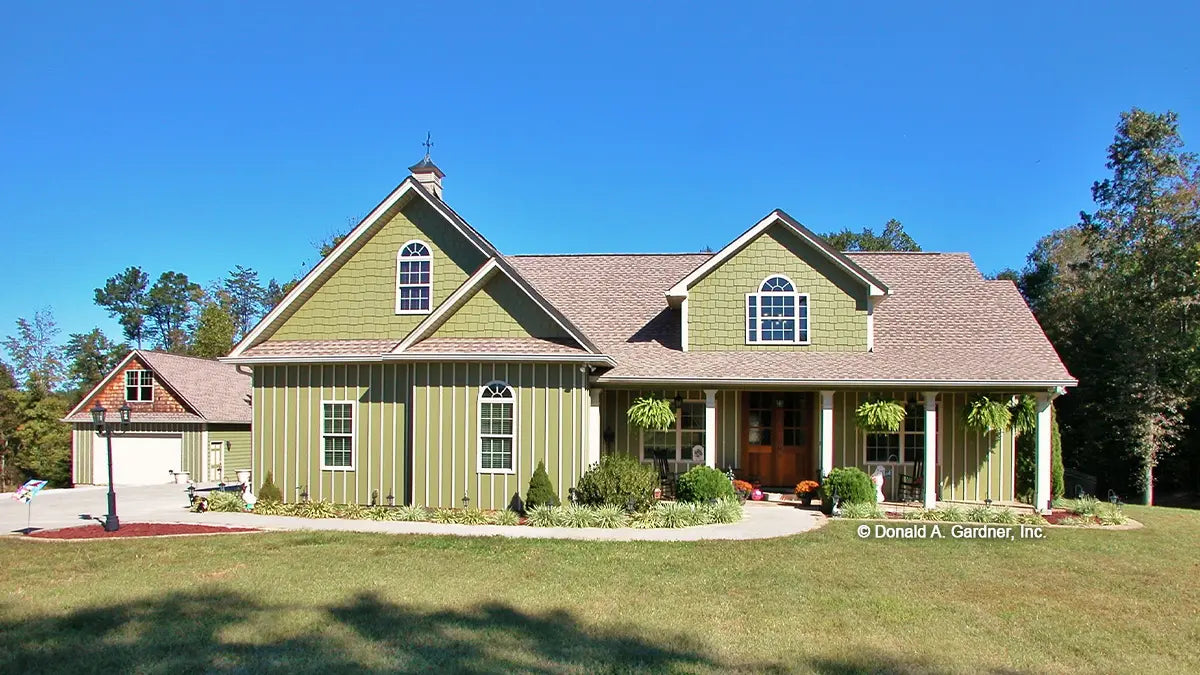 This is a photograph of the front of country house plan 1075 The Ives as built by a customer