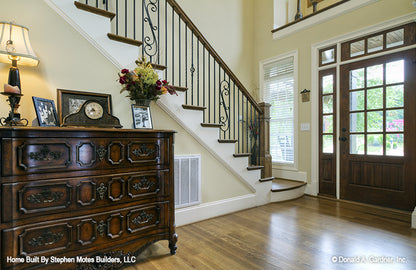 Open glass door to the foyer letting in natural light. The Ivy Creek plan 921