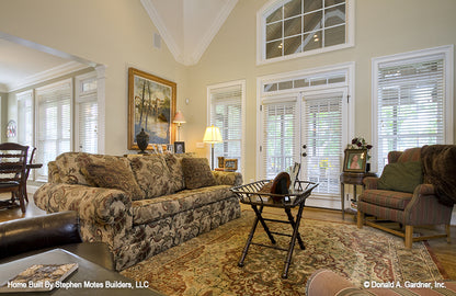 Second story Great room with French doors leading to patio. The Ivy Creek plan 921