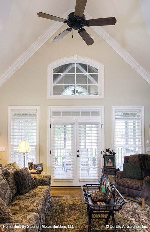 Vaulted ceiling in Great room with large upper window. The Ivy Creek plan 921