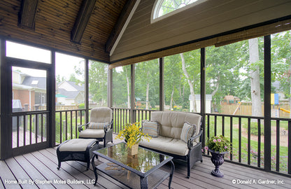 Second view of the screened in porch with semi-circle window below the vaulted ceiling. The Ivy Creek plan 921