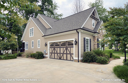 Side garage view photograph provided by the customer. The Ivy Creek plan 921