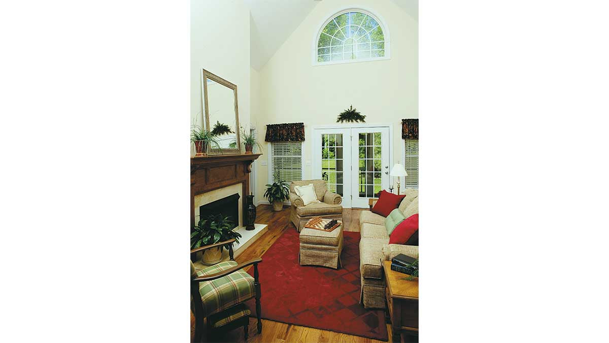 This is a photograph of the great room doors of three bedroom house plan 432 The Jacksonboro as built by a customer