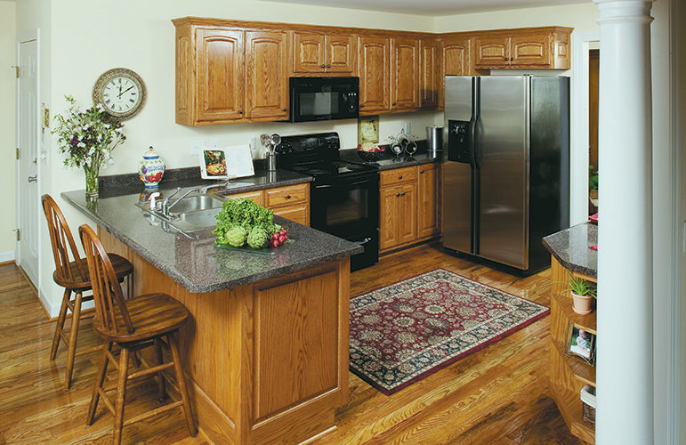 This is a photograph of the kitchen island of three bedroom house plan 432 The Jacksonboro as built by a customer