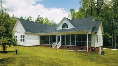 This is a photograph of the rear of three bedroom house plan 432 The Jacksonboro as built by a customer