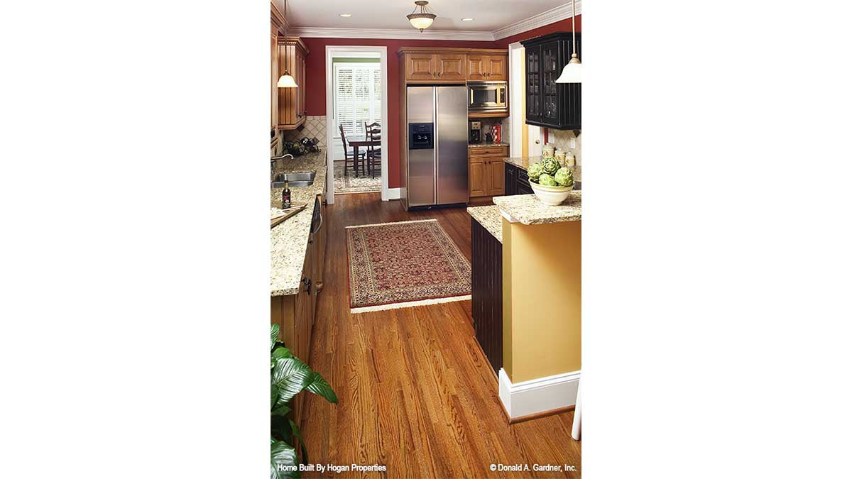 Flat ceiling and recessed lights in the kitchen. The Jamestowne plan 828. 