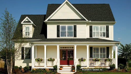 Photographs are submitted by the customer. Front view of a classic farmhouse. The Jamestowne plan 828. 